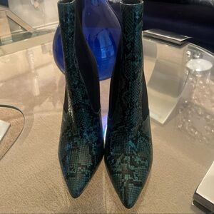 Brand new heel boots faux snake skin green and black 4’ inch boot.